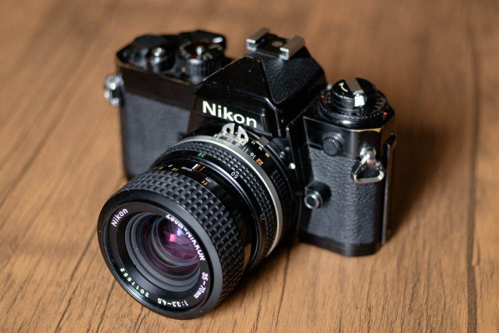 Nikon EM +MD-E+zoom-NIKKOR 35-70 3.3-4.5